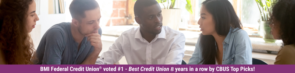 group of young adults around a table