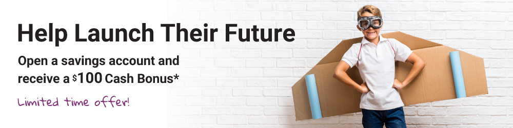 children on the floor writing in notepads