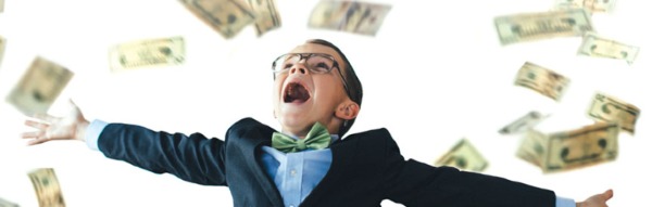 child in a business suit with money
