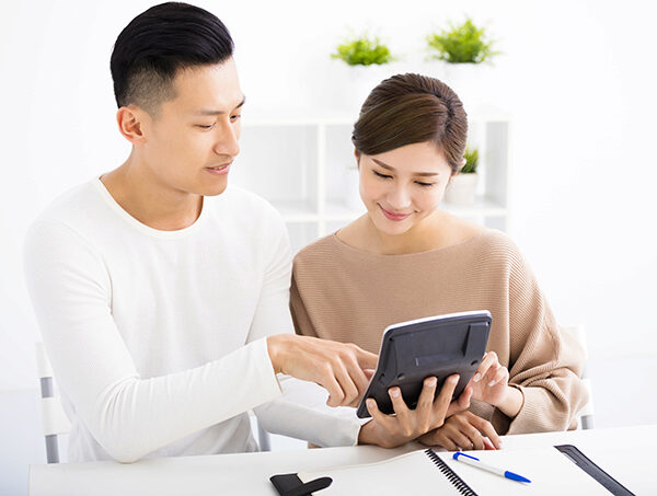 couple looking at laptop