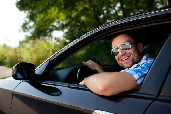 guy smiling in car