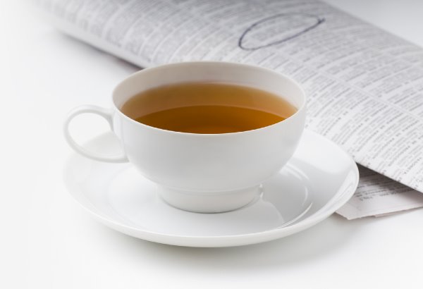 mug of tea on a newspaper classified