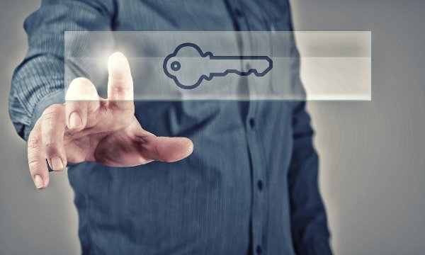 man touching digital key