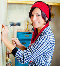 woman painting her house